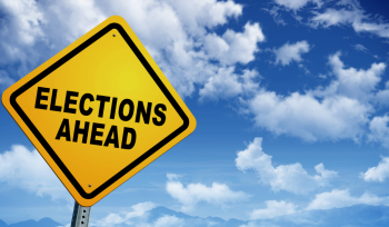 A placard showing "Election Ahead"