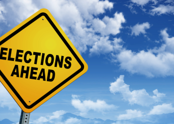 A placard showing "Election Ahead"