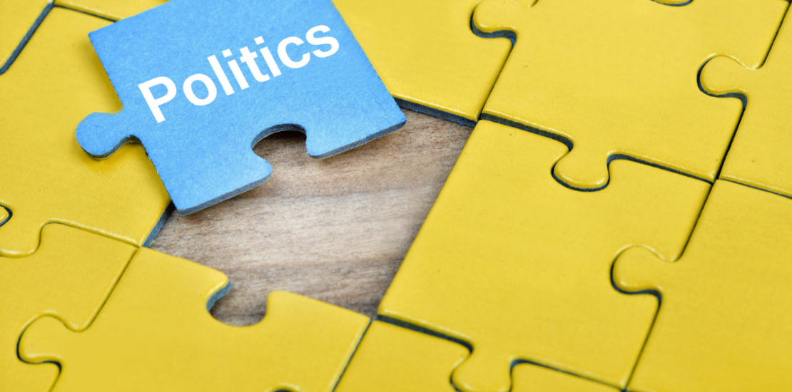 A puzzle piece with the word Politics