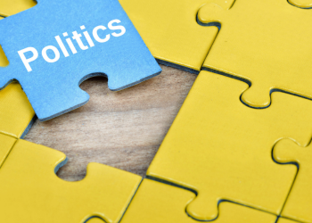 A puzzle piece with the word Politics